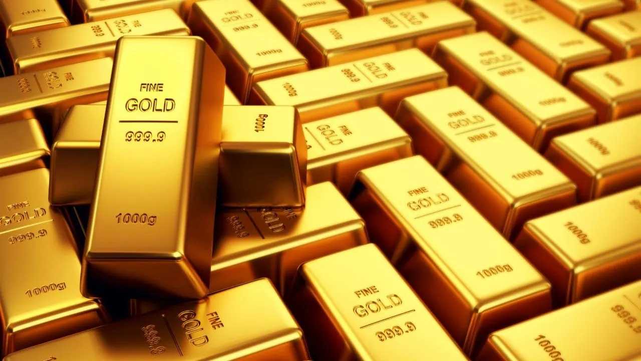 Rows of fine gold bars stamped 999.9, 1000g